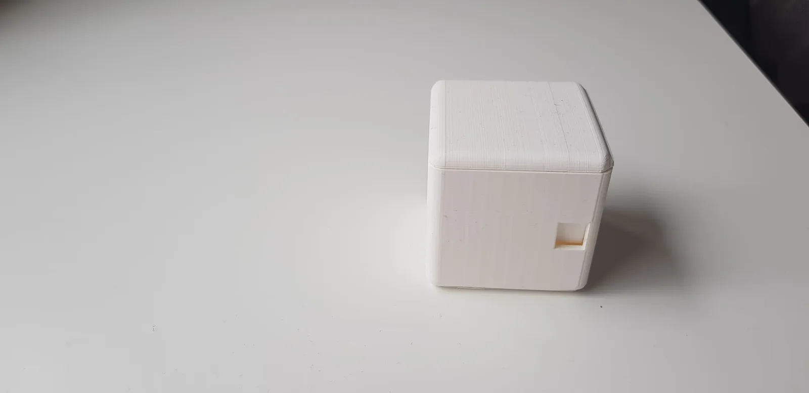 A photo of one of the 3D printed prototypes of the box, showing the large locking mechanism in practice