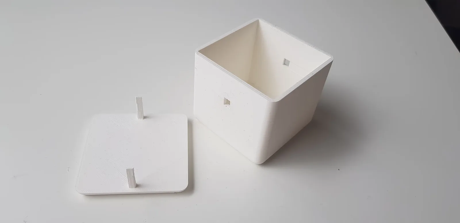 A photo of one of the 3D printed prototypes of the box, testing the smaller locking mechanism