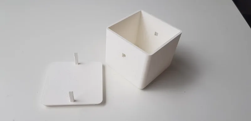 A photo of one of the 3D printed prototypes of the box, testing the smaller locking mechanism
